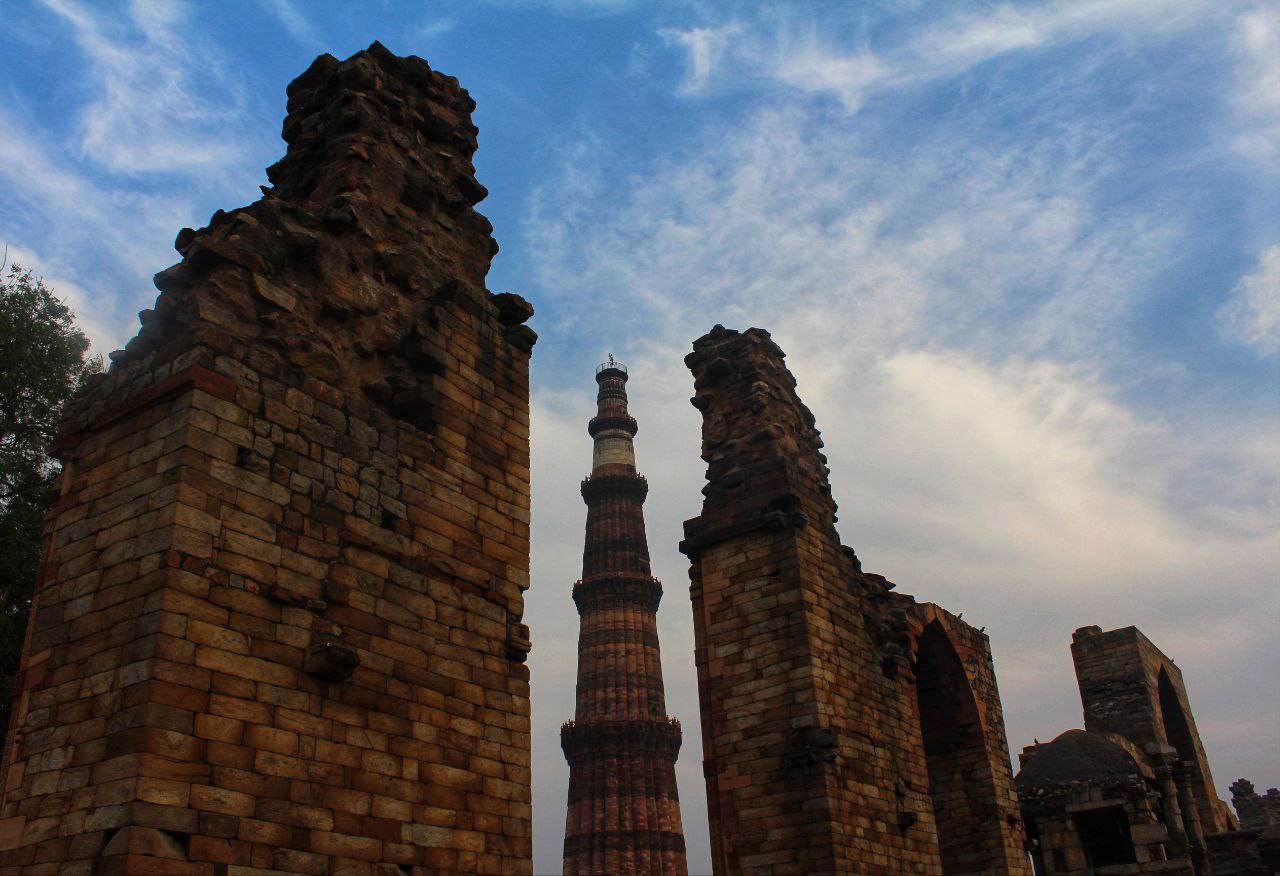 a group of tall brick structures